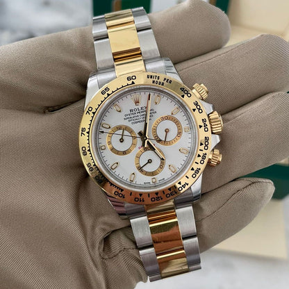 Daytona Steel & Gold White Dial 116503